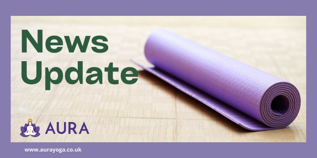 Text: News Update Image of a rolled up purple yoga mat on a cork floor